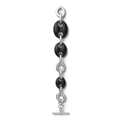 Trebor Style sterling silver and black ebony wood link bracelet with a toggle clasp, featuring a striking contrast.