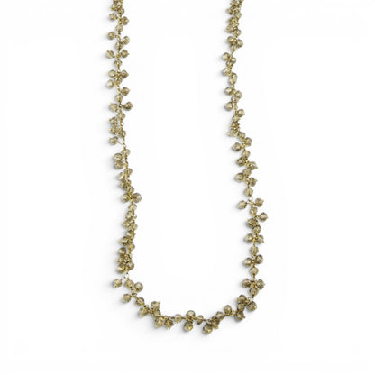 Trebor Style long necklace featuring faceted smokey quartz gemstones on 14k gold wire, versatile layering jewelry.