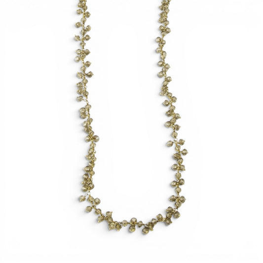 Trebor Style long necklace featuring faceted smokey quartz gemstones on 14k gold wire, versatile layering jewelry.