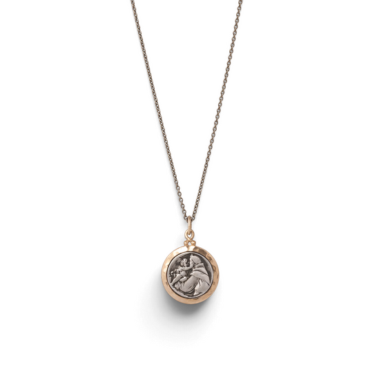 Trebor Style St. Anthony of Padua pendant in sterling silver with a 14k gold frame on a silver cable chain.