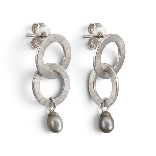 Trebor Style double ring drop earrings in brushed sterling silver with oval grey cultured pearls and post backs.