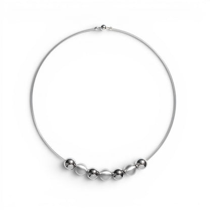 Trebor Style sterling silver collar necklace featuring alternating polished and satin-finish orbs on double wire.