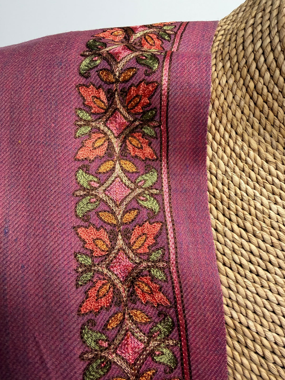 Trebor Style Taisha orchid wool-blend shawl featuring intricate peach, pink, and green hand-embroidered floral borders.