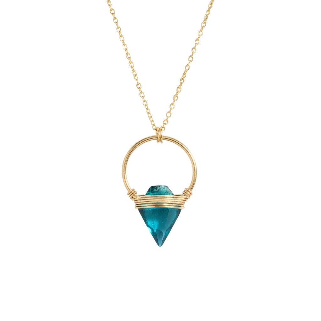 Trebor Style Albatross necklace featuring a teal quartz arrowhead caged in a 14k gold-filled hoop on an 18-inch chain