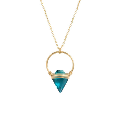 Trebor Style Albatross necklace featuring a teal quartz arrowhead caged in a 14k gold-filled hoop on an 18-inch chain