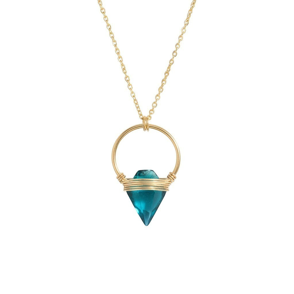 Trebor Style long necklace featuring a teal quartz arrowhead pendant in a 14k gold-filled wire cage on a 28-inch chain.