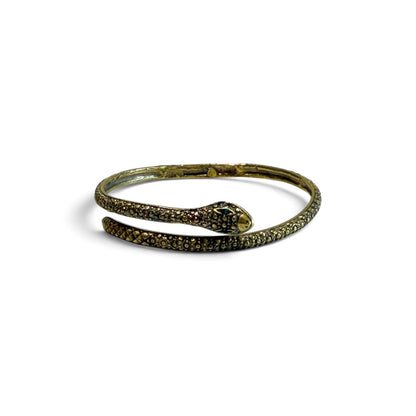 Trebor Style textured serpent bangle with a sinuous snake design, crafted in a metallic finish for arm or wrist wear.