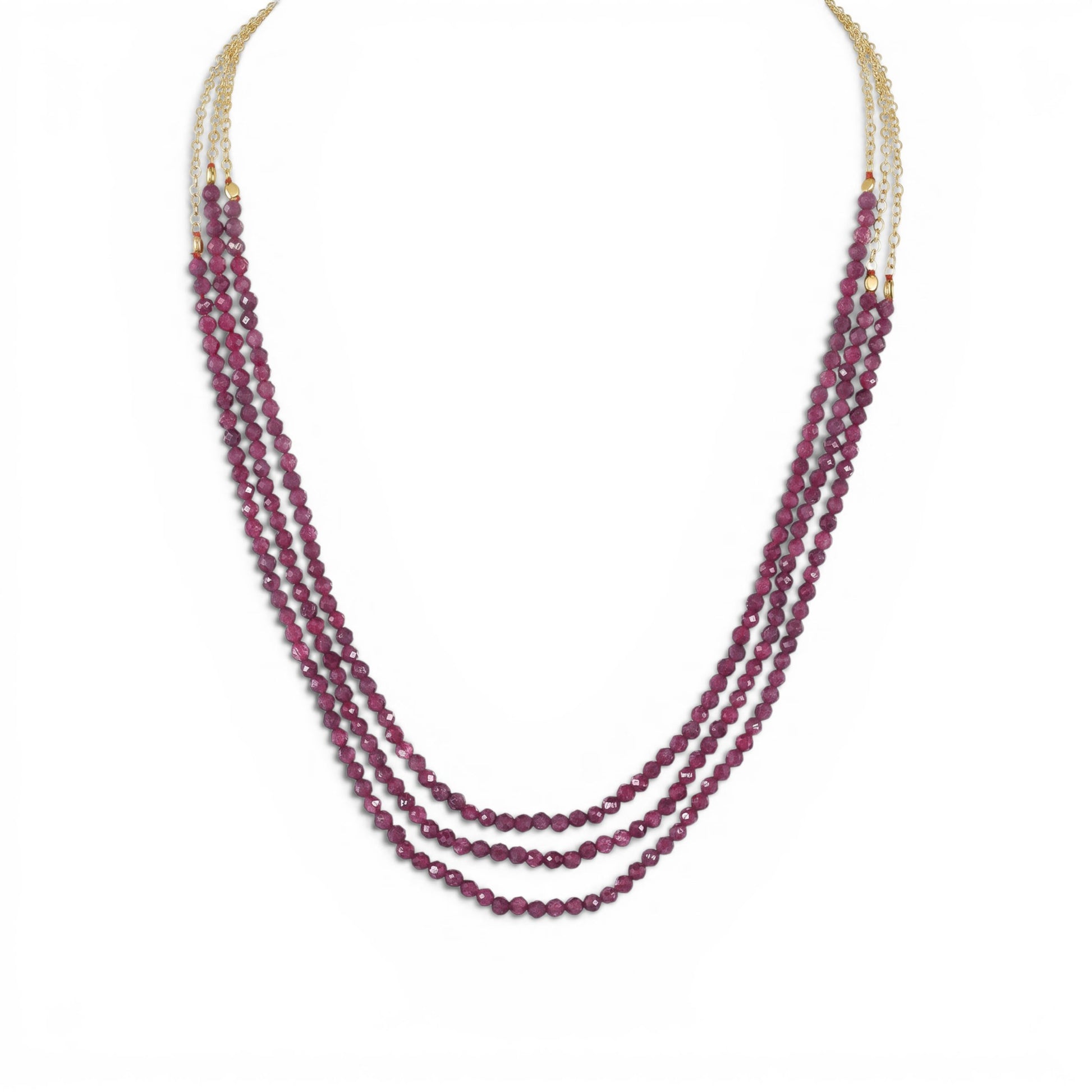 Trebor Style three-strand necklace featuring faceted ruby beads on a 14k gold-filled adjustable cable chain.