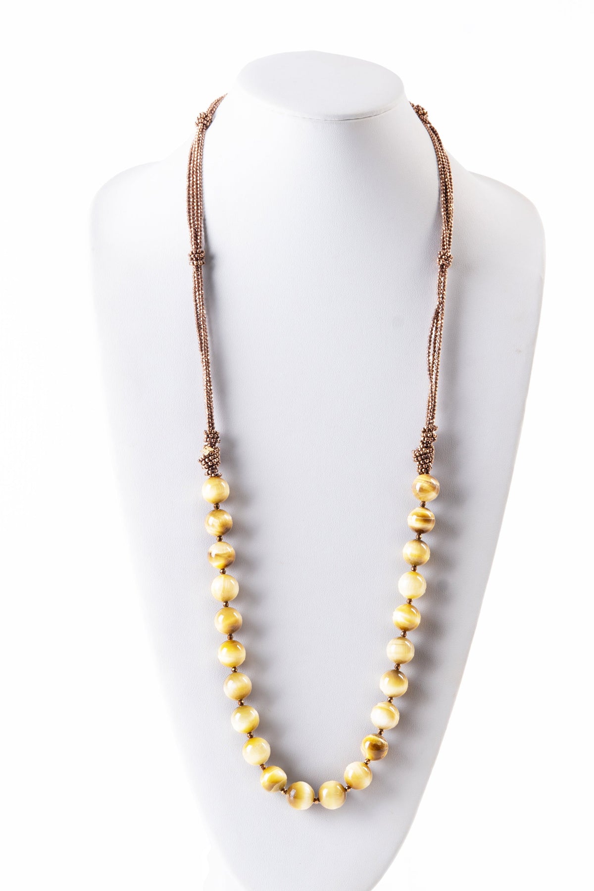 Trebor Style long Rajola necklace featuring large Tiger Eye beads and multi-strand copper Hematite accents.