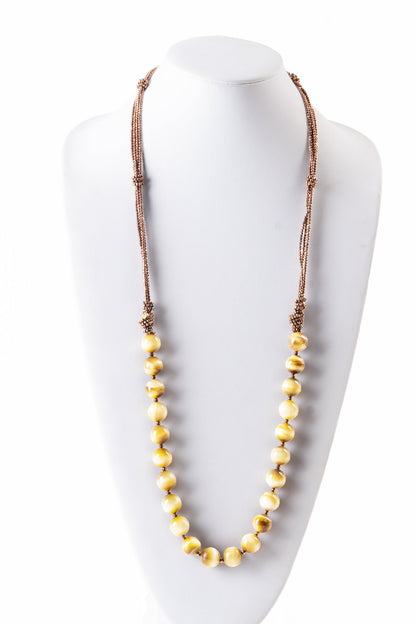 Trebor Style long Rajola necklace featuring large Tiger Eye beads and multi-strand copper Hematite accents.