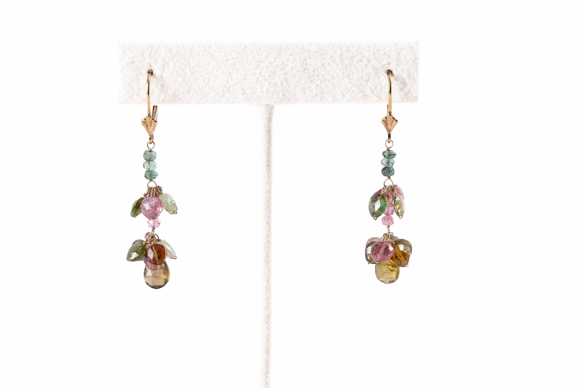 Trebor Style 14k yellow gold dangle earrings featuring multi-colored pink and green tourmaline gemstone drops.
