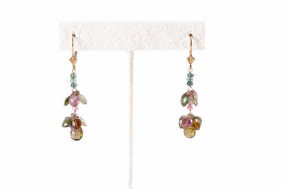 Trebor Style 14k yellow gold dangle earrings featuring multi-colored pink and green tourmaline gemstone drops.