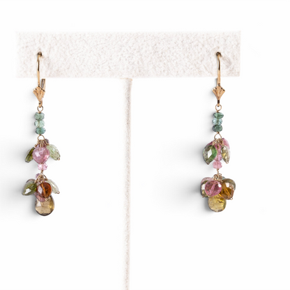 Trebor Style 14k yellow gold dangle earrings featuring multi-color pink and green faceted tourmaline gemstone drops.