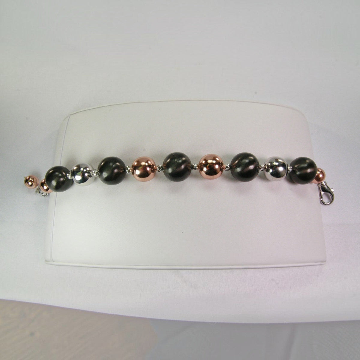 Trebor Style tri-color sterling silver bead bracelet featuring rhodium, oxidized, and rose gold plated beads.