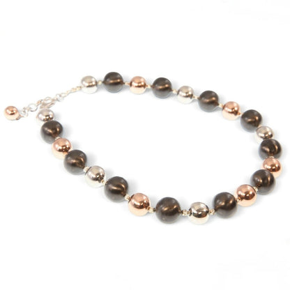 Trebor Style tri-color sterling silver bead necklace with rhodium, oxidized, and rose gold plated finishes.
