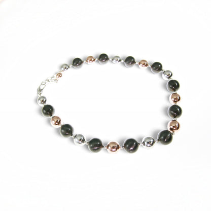 Trebor Style tri-color sterling silver bead necklace featuring rhodium, oxidized, and rose gold plated beads.