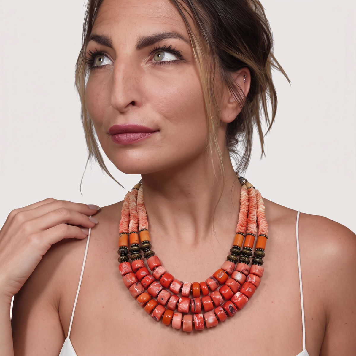 Trebor Style Masha Archer triple strand necklace featuring orange coral rondelles, pewter beads, and floral accents.