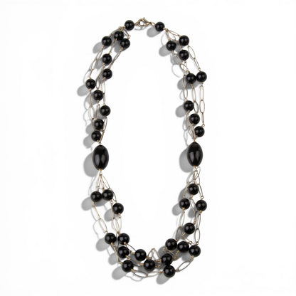 Trebor Style long triple strand necklace featuring black onyx beads and rose gold plated sterling silver open links.