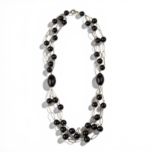 Trebor Style long triple strand necklace featuring black onyx beads and rose gold plated sterling silver open links.