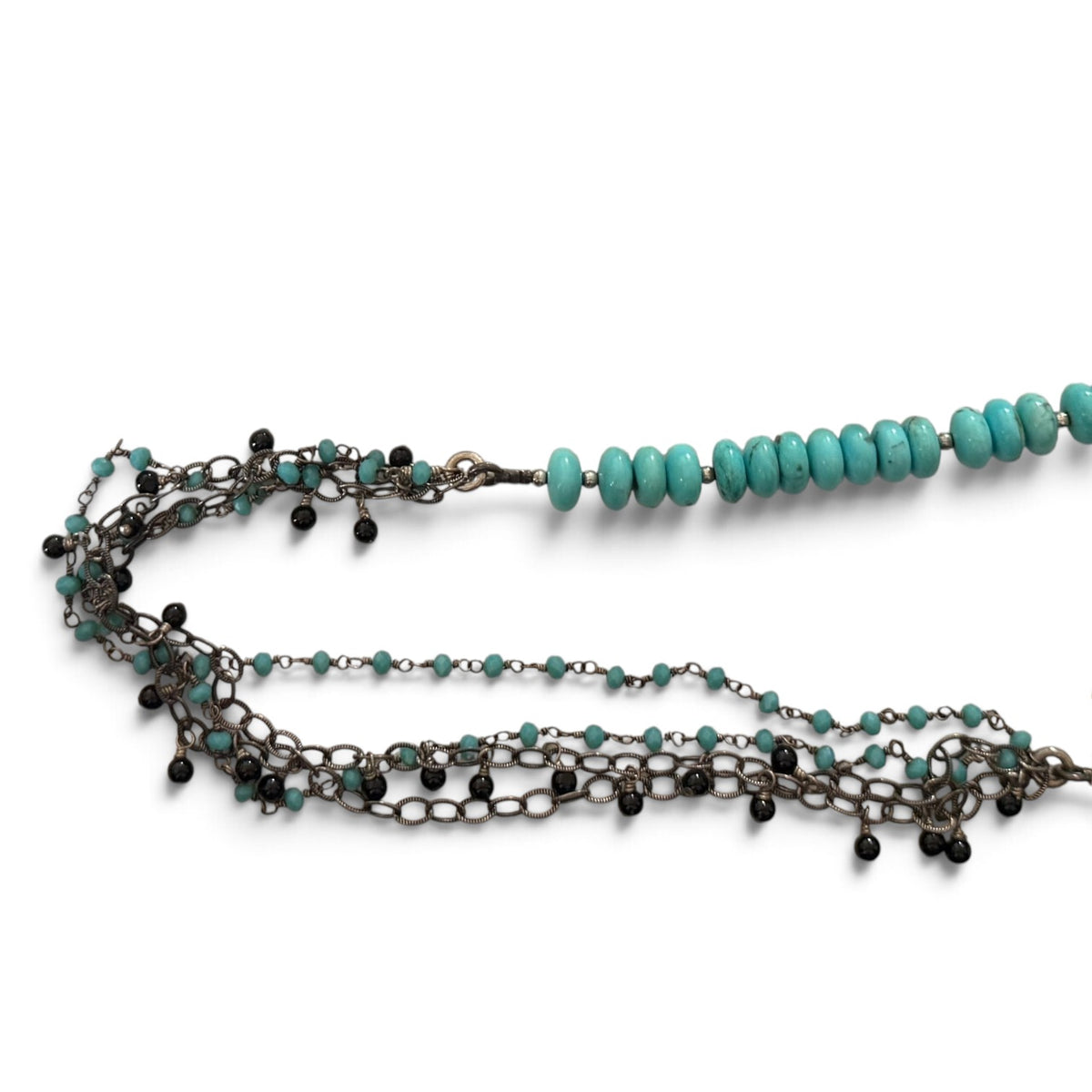 Trebor Style asymmetrical necklace featuring turquoise beads, amazonite, spinel, and sterling silver multi-strand chain.