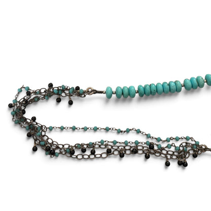 Trebor Style asymmetrical necklace featuring turquoise beads, amazonite, spinel, and sterling silver multi-strand chain.