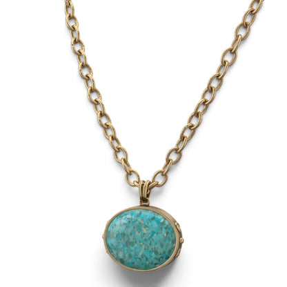 Trebor Style handcrafted necklace featuring a genuine blue turquoise pendant on a long golden bronze chain.