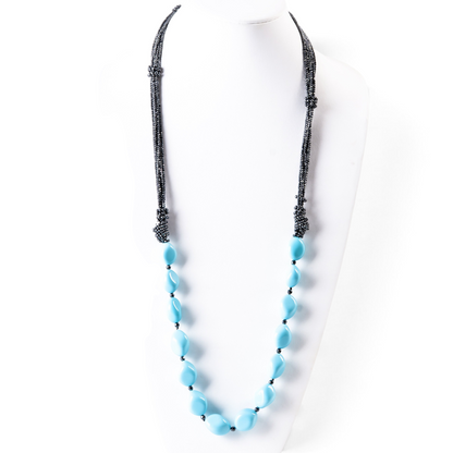 Trebor Style long necklace featuring large turquoise faux beads and multi-strand gray hematite accents, made in Italy.