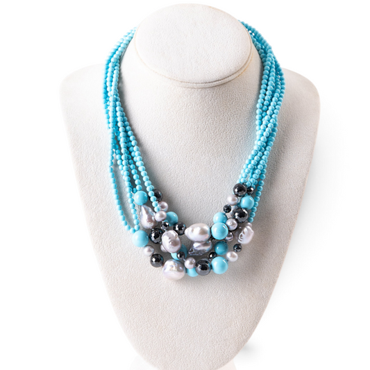 Trebor Style multi-strand necklace featuring turquoise beads, baroque pearls, and hematite on an adjustable cord.