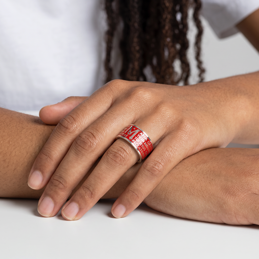 Trebor Style Tuum Animae Mater ring in sterling silver with red enamel and Ave Maria Latin text on a model's finger