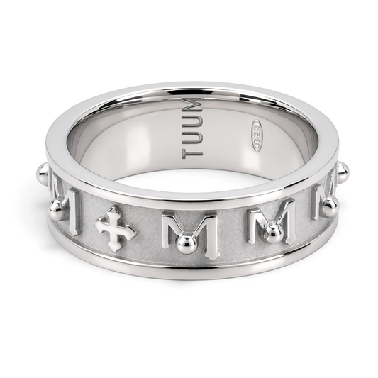 Trebor Style TUUM Decem ring in white rhodium plated sterling silver featuring raised M symbols and crosses.