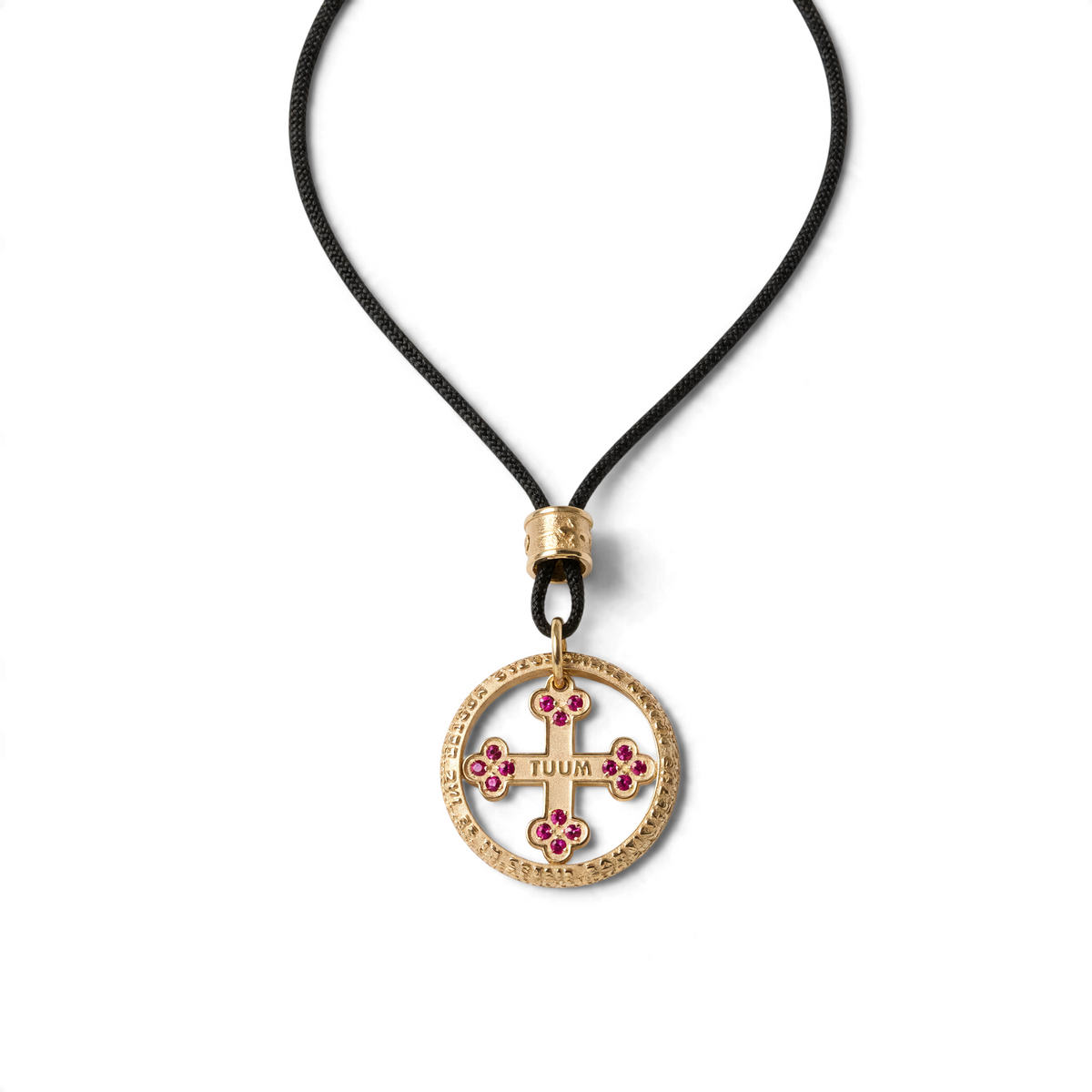 Trebor Style TUUM Flore pendant necklace featuring a gold-plated cross and flower motif with red rubies on a black cord