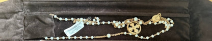 Trebor Style TUUM Rosario necklace featuring white pearls and yellow gold plated sterling silver medallions.