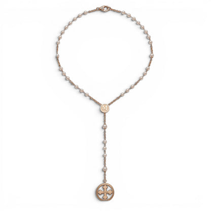 Trebor Style TUUM Rosario necklace featuring white pearls, yellow gold plated sterling silver chain, and Flore pendant.