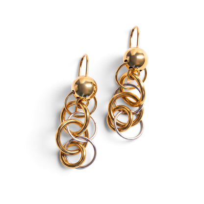 Trebor Style Frederic Duclos two-tone sterling silver and gold plated drop earrings with graduating ring clusters.