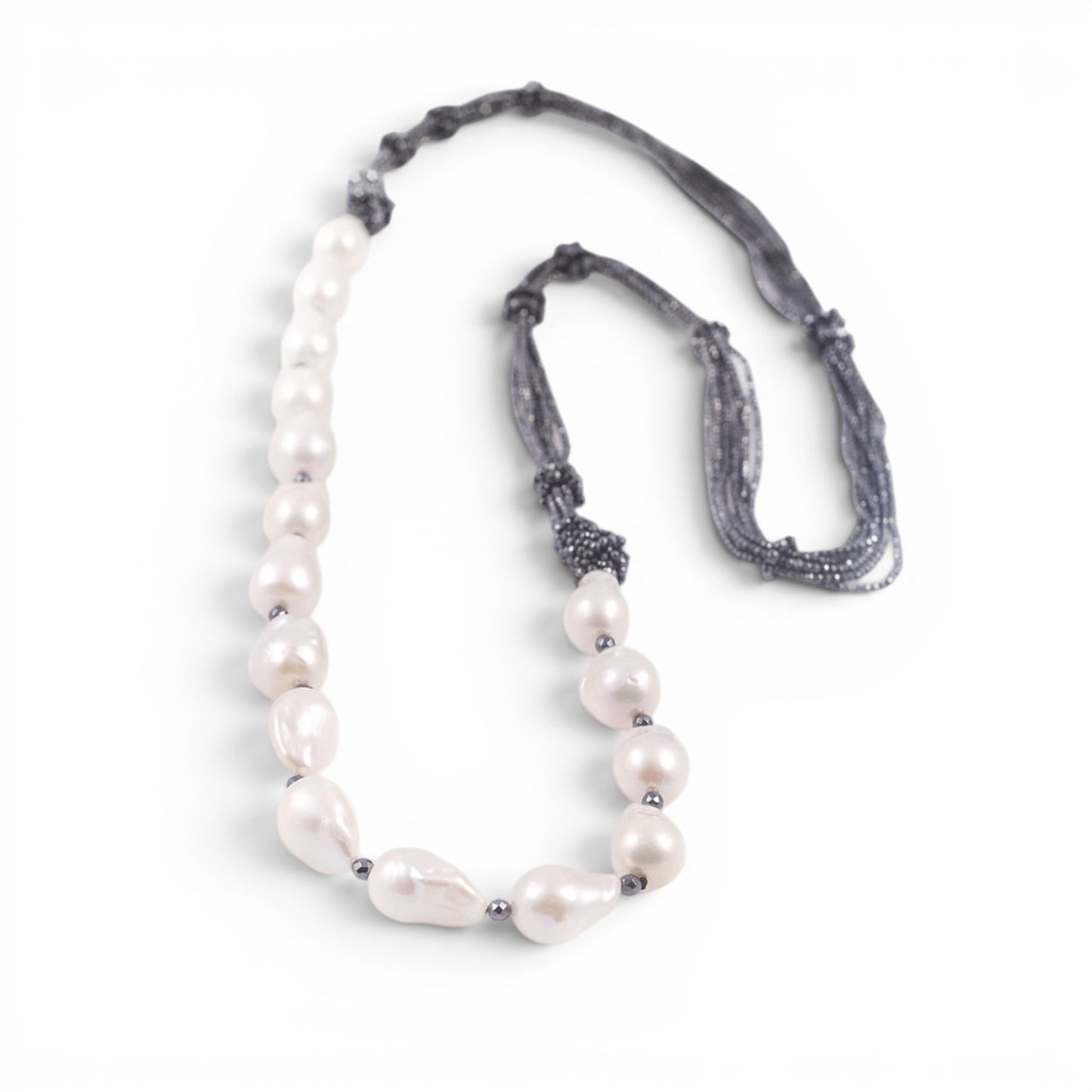 Trebor Style long necklace featuring large white baroque pearls and multi-strand hematite accents, made in Italy.