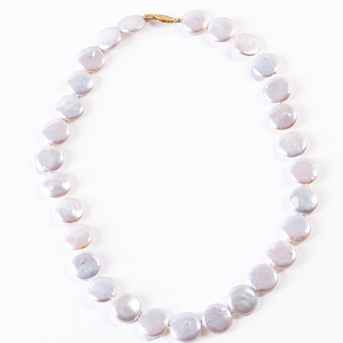 Trebor Style white freshwater coin pearl necklace with a 14k gold latch clasp, 17 inches long.