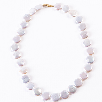 Trebor Style white freshwater coin pearl necklace with a 14k gold latch clasp, 17 inches long.