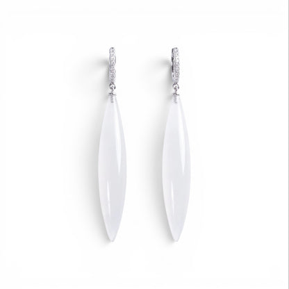 Trebor Style long drop earrings featuring translucent white marquise pendants on silver pavé crystal hoops.