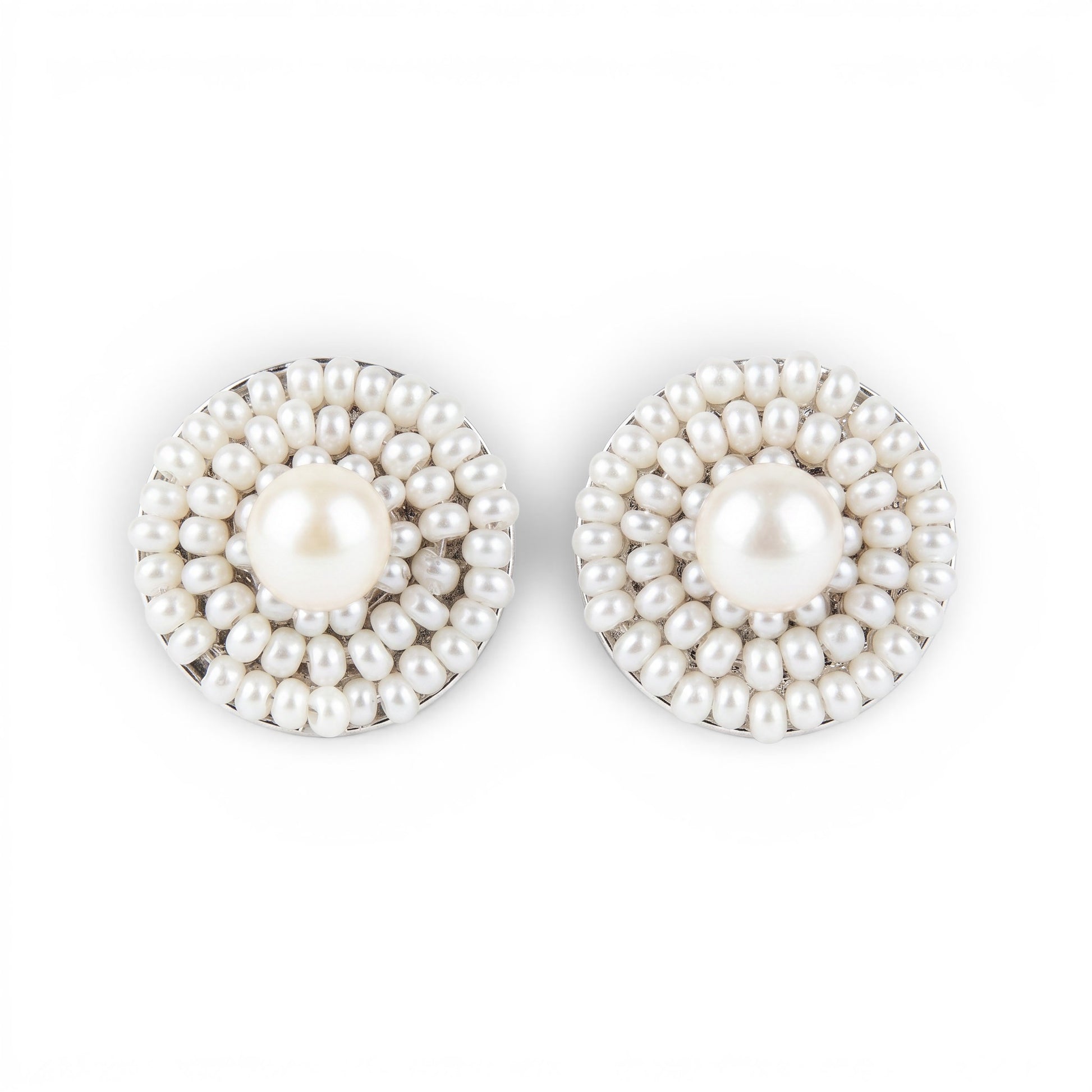 Trebor Style Ziio white freshwater pearl button earrings with Murano glass bead frames and sterling silver posts.