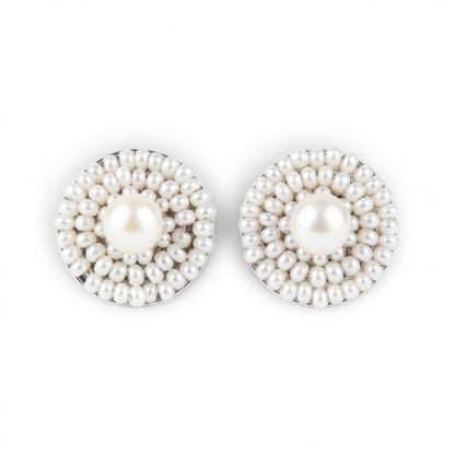 Trebor Style Ziio white freshwater pearl button earrings with Murano glass bead frames and sterling silver posts.