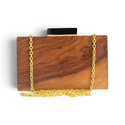 Trebor Style handmade wooden box bag with a gold chain strap and magnetic closure, featuring a natural wood grain.