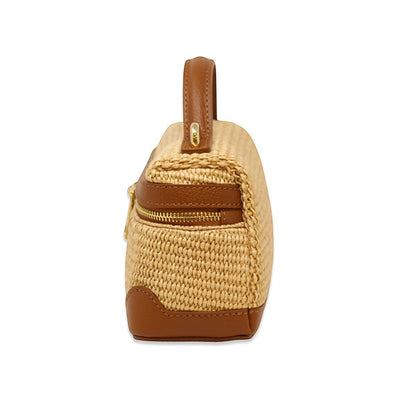 Trebor Style camel woven beach bag with a structured top handle and gold zipper detail, side view