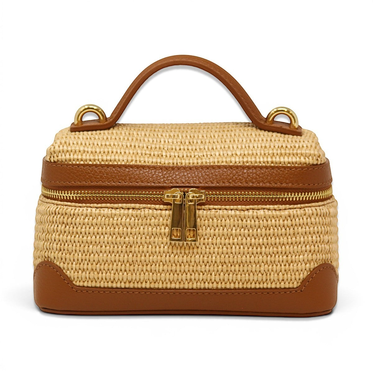 Trebor Style camel woven top-handle beach bag with structured silhouette, gold hardware, and leather trim.