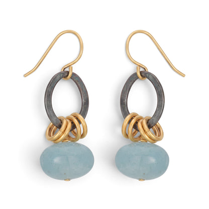 Trebor Style Xian mixed metal earrings featuring sky blue aquamarine donut gemstones, oxidized silver, and gold hooks.