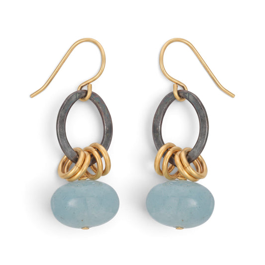 Trebor Style Xian mixed metal earrings featuring sky blue aquamarine donut gemstones, oxidized silver, and gold hooks.