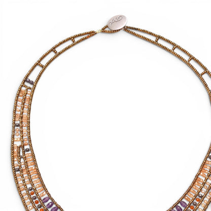 Trebor Style Ziio Aki bib necklace featuring carnelian, amethyst, garnet, and Murano glass beads on stainless steel.