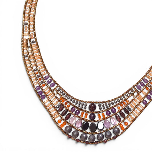 Trebor Style Ziio Aki bib necklace featuring carnelian, amethyst, garnet, and Murano glass beads on stainless steel.