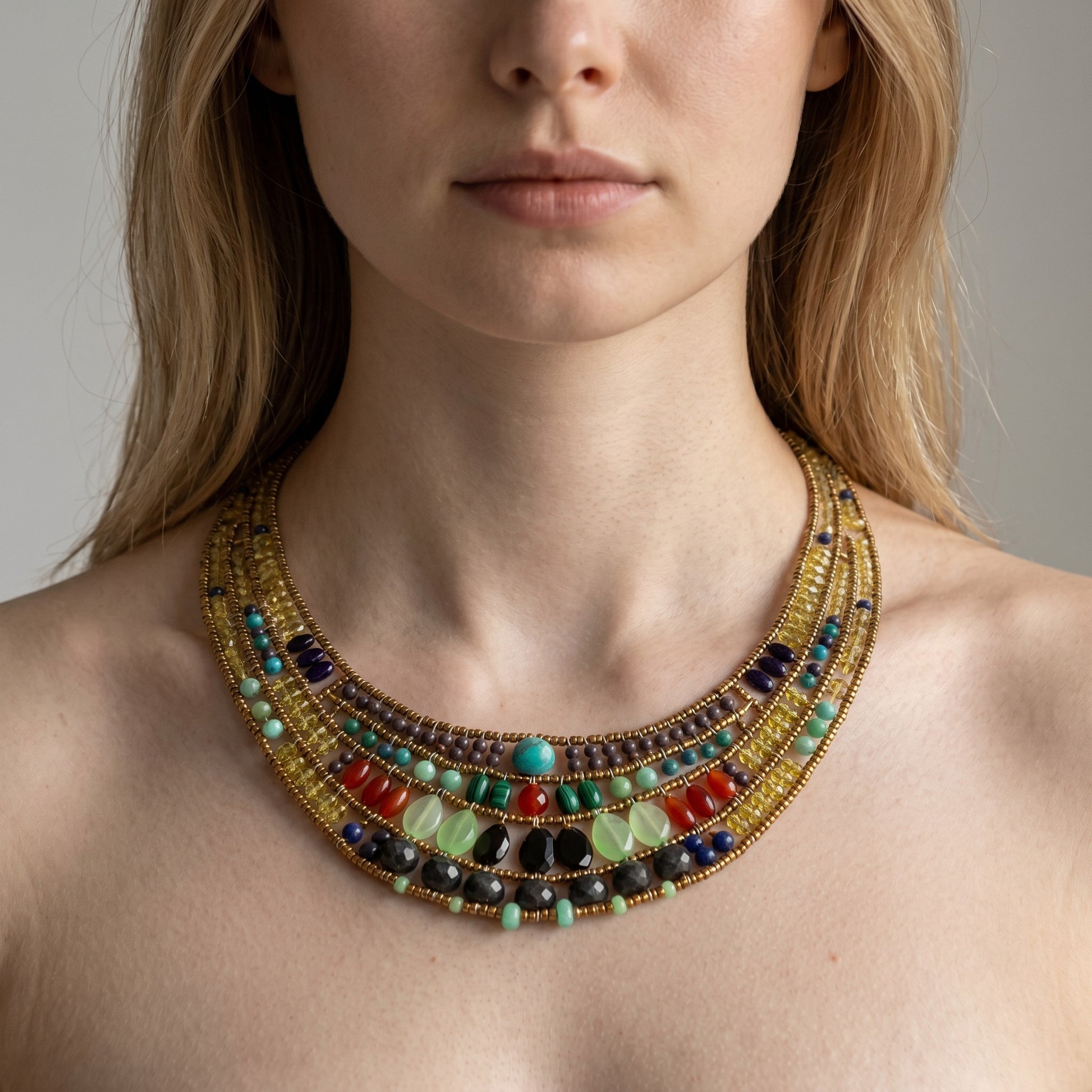 Trebor Style Ziio Aki statement bib necklace featuring multi-colored gemstones and Murano glass beads on a model