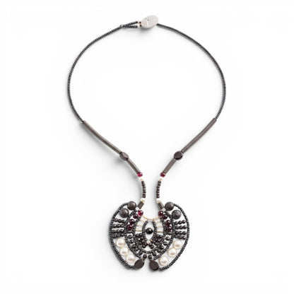 Trebor Style Ziio Aki statement necklace featuring black onyx, garnet, and white pearl beads on stainless steel wire.