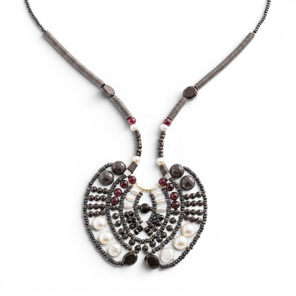 Trebor Style Ziio Aki statement necklace featuring black onyx, garnet, and white pearl beads on stainless steel wire.